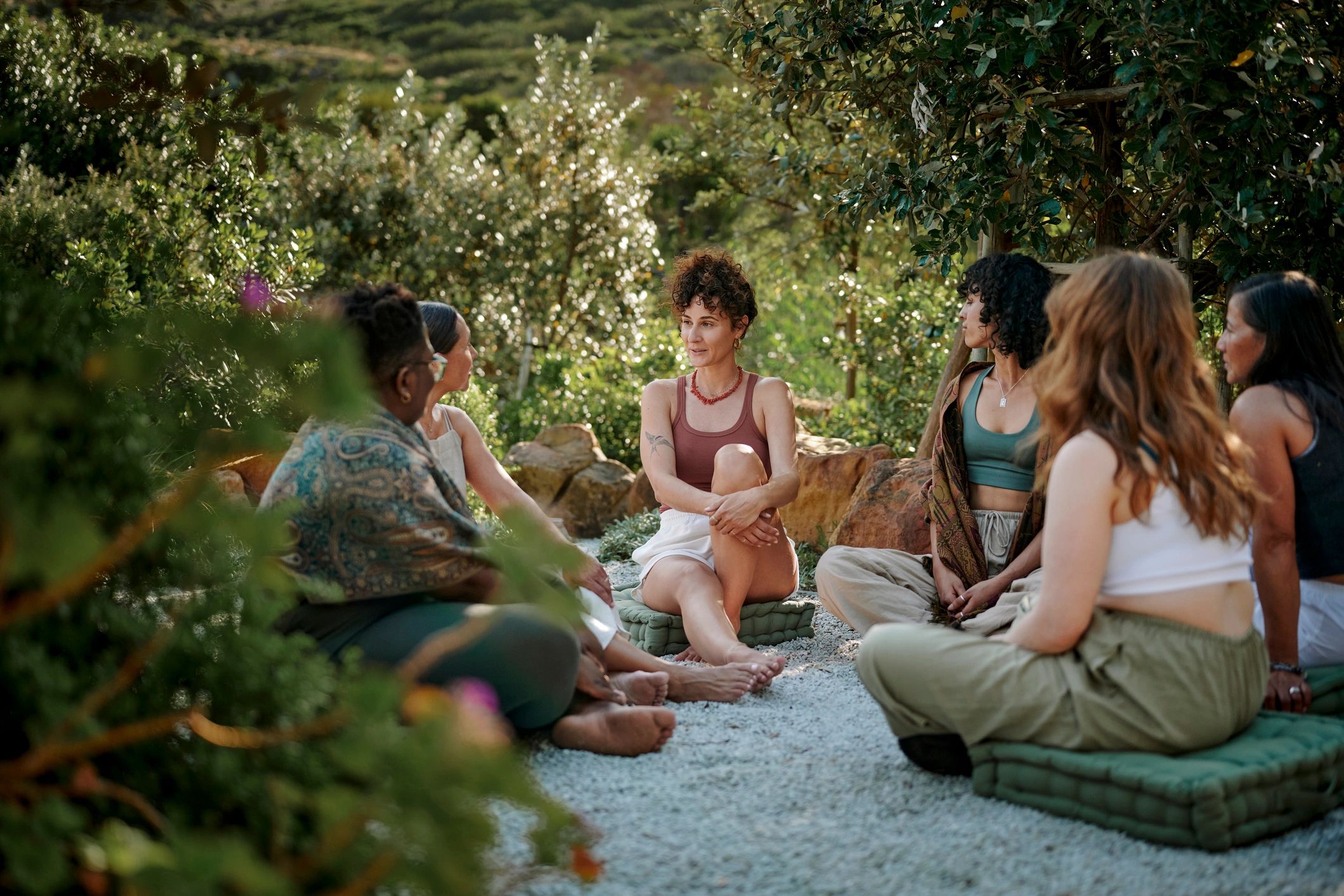 Women in conversation at a wellness retreat